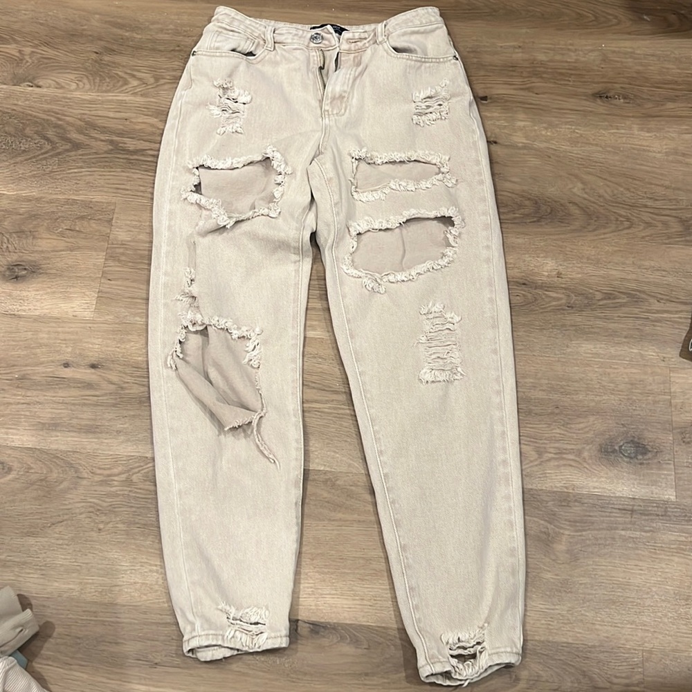 Tan distressed mom jeans
